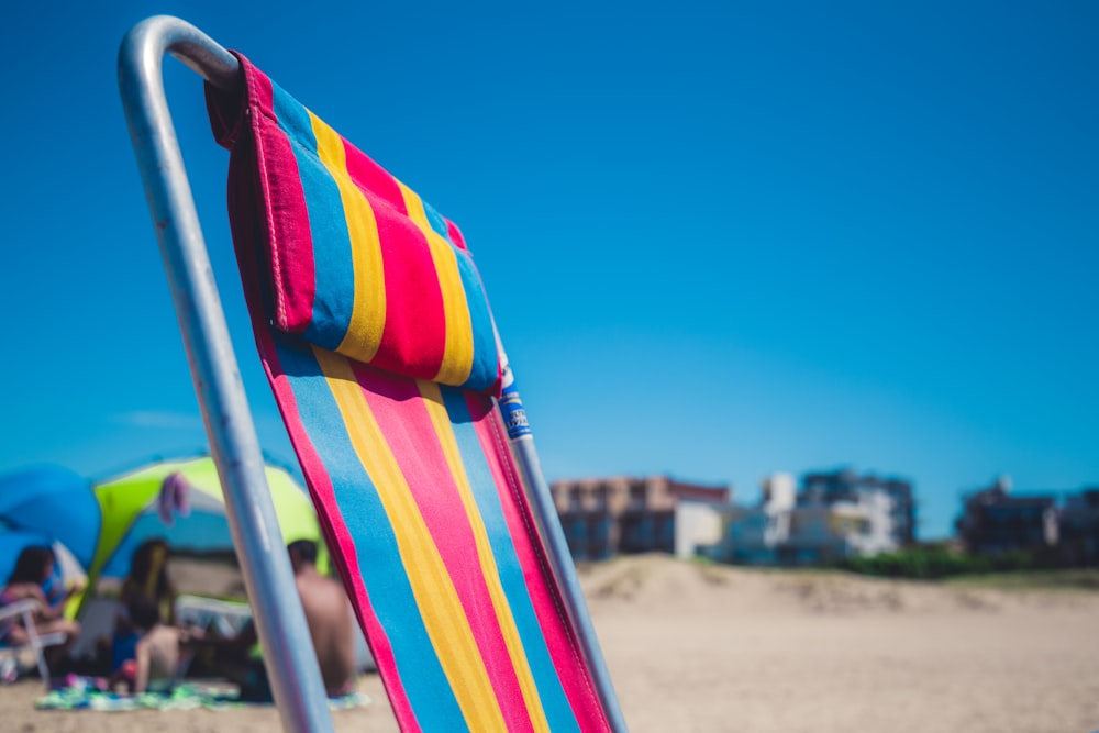 selective focus photography of lounge chair