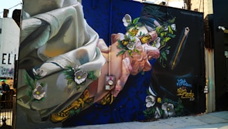 A lively mural showing diverse hands planting a flourishing tree symbolizing prosperity.