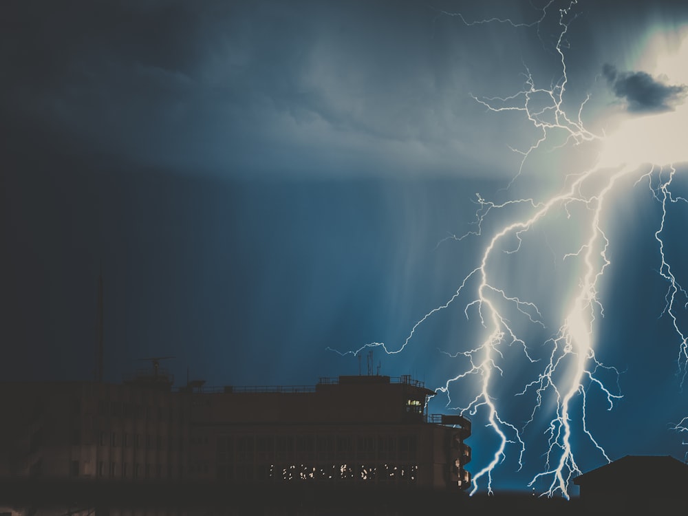 silhouette photo of thunder during nighttime