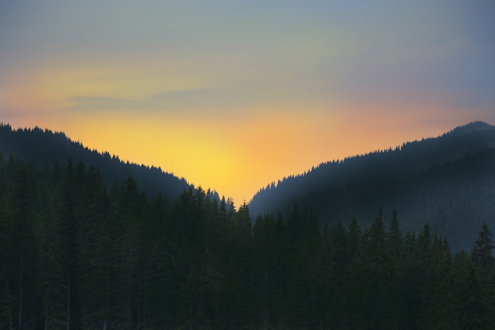 black mountain during sunrise