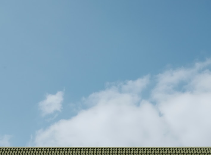 green wooden house roof