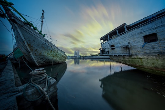 photo of Sunda Kelapa Harbor Waterway near National Monument