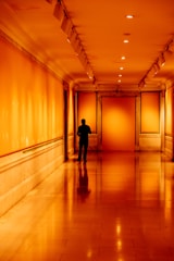 person stands near entrance