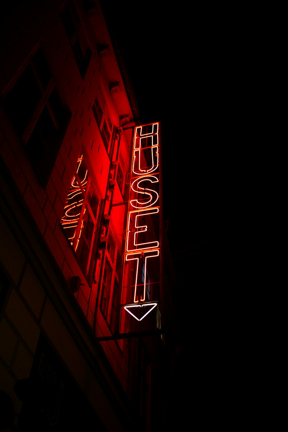 red lighted huset signage