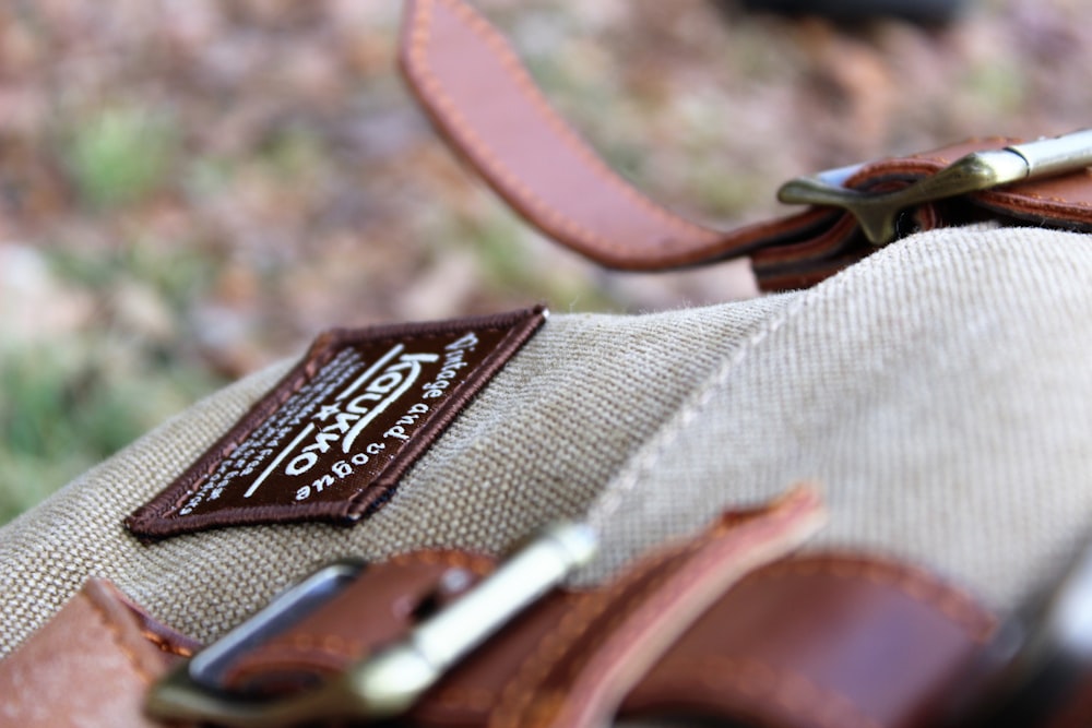 selective focus photo of gray and brown Kaukko satchel bag