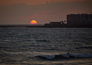A vibrant sunset over Bali's famous surf beaches.