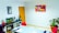 A serene office space with plants and wellness resources, showcasing a healthy work environment.
