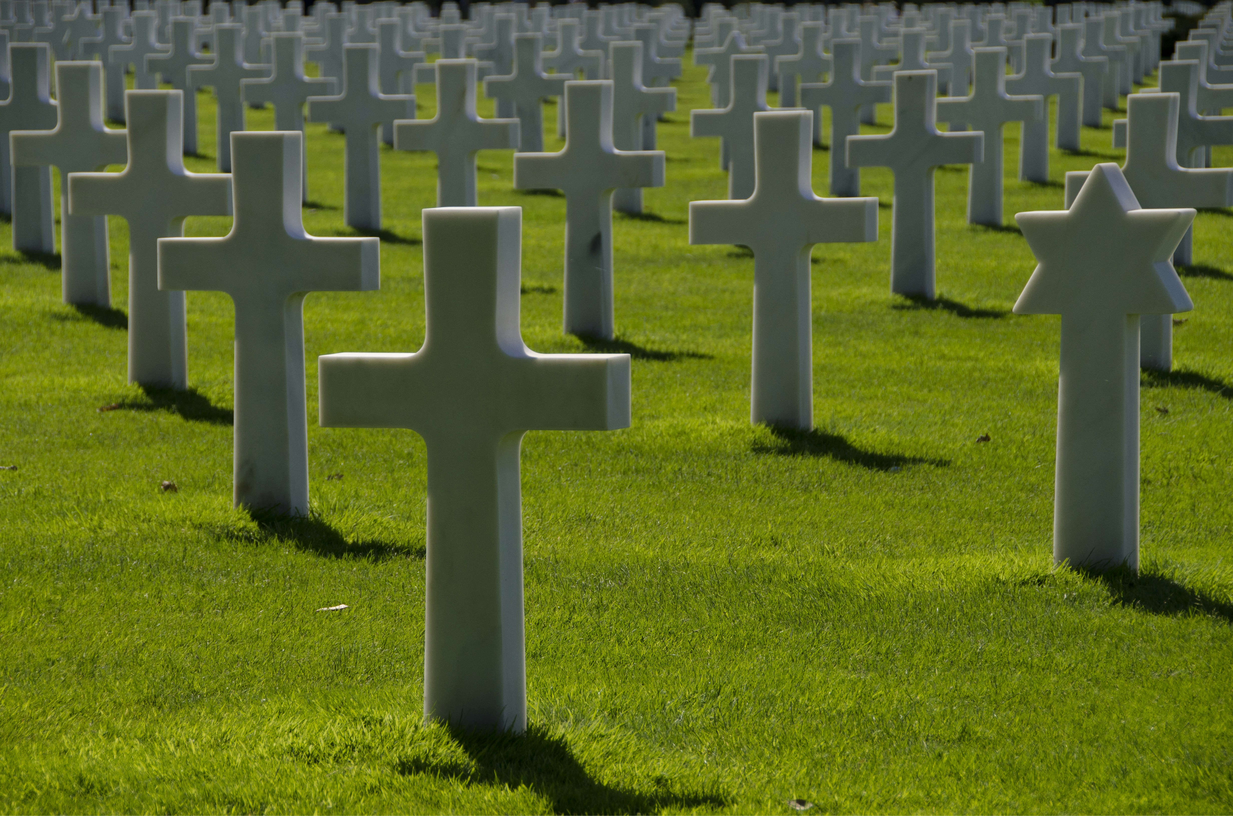 great photo recipe,how to photograph so many.....; cemetery in green open field during daytime