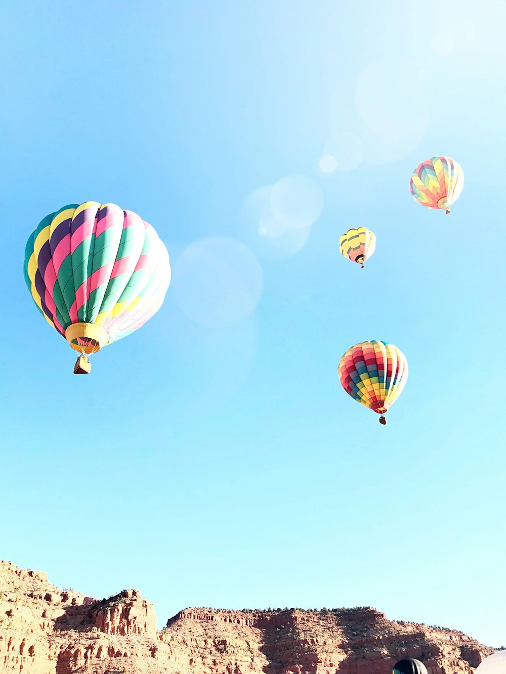 four hot air balloons