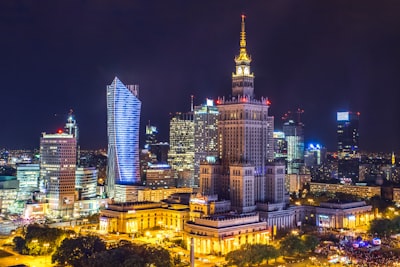 high-rise buildings during night time poland teams background