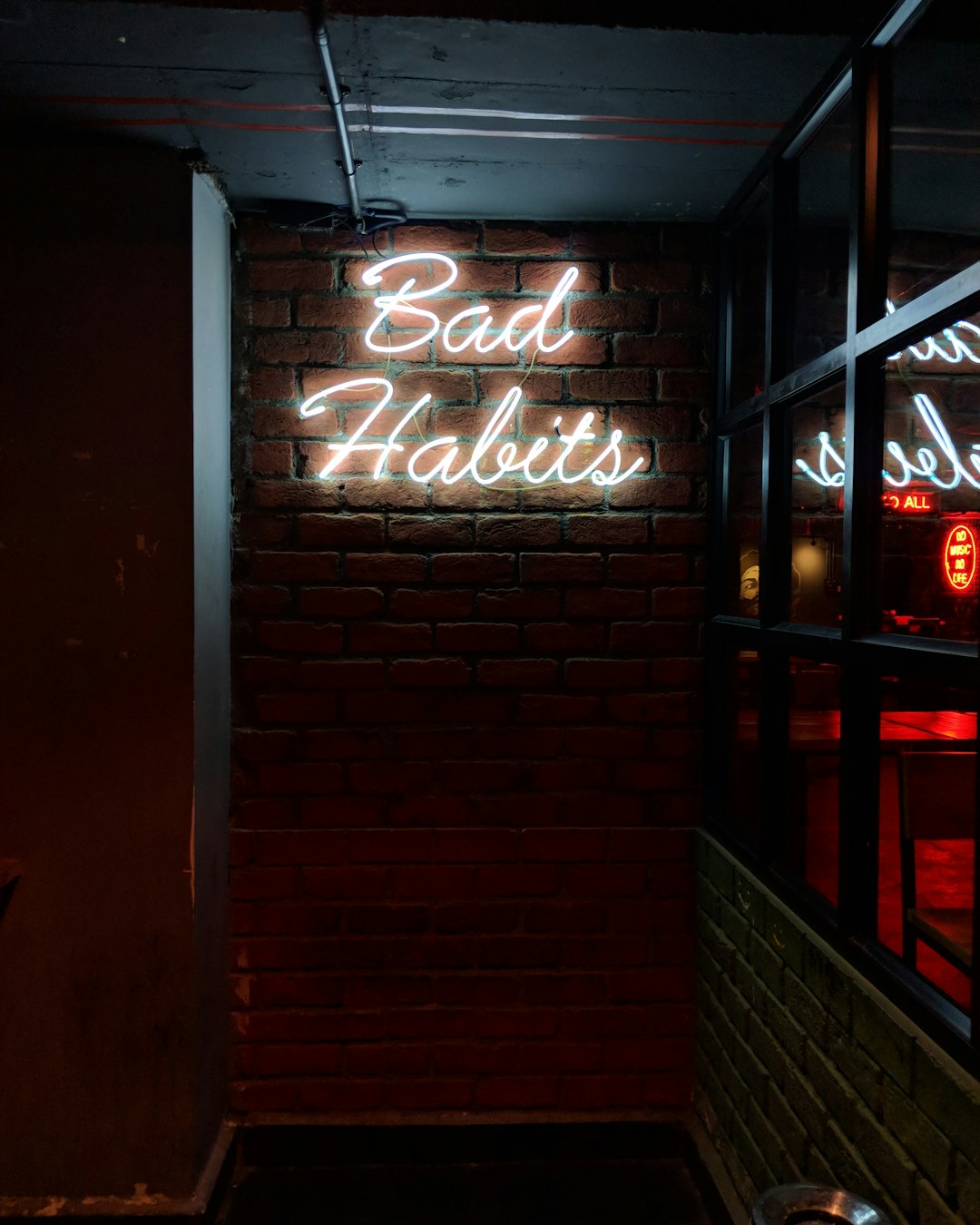 white bad habits LED signage