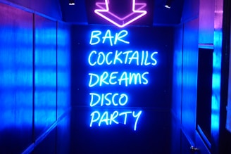 neon sign reading bar cocktails dreams disco party, the nightlife, rstour