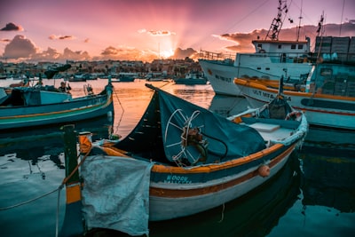 boats on body of water during golden hour malta google meet background