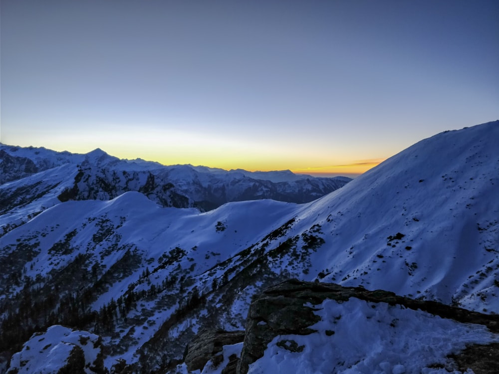 photo of mountains covered with snow