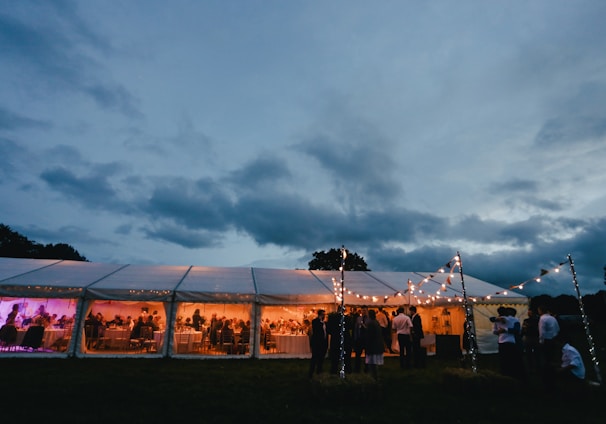 landscape photography of white canopy tent