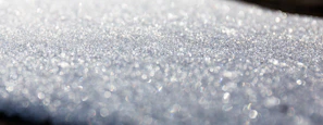 Close-up of sparkling surfaces with subtle sparkle effects emphasizing cleanliness and care.