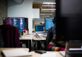 black flat screen computer monitors