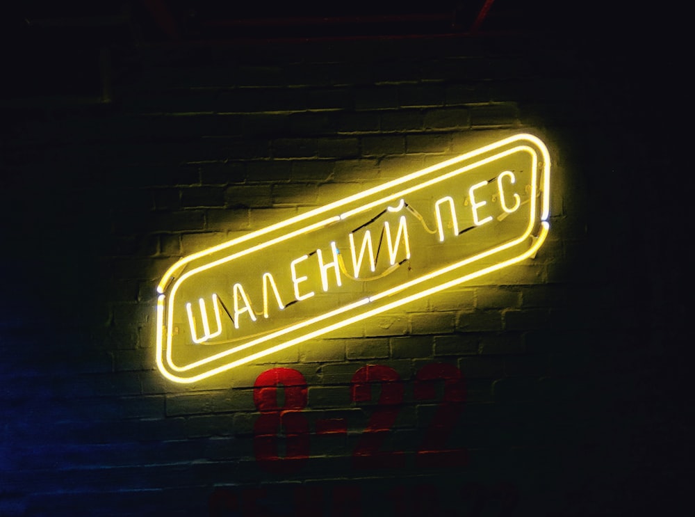 yellow Waaehann nec neon-light signage