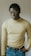 man wearing yellow sweater