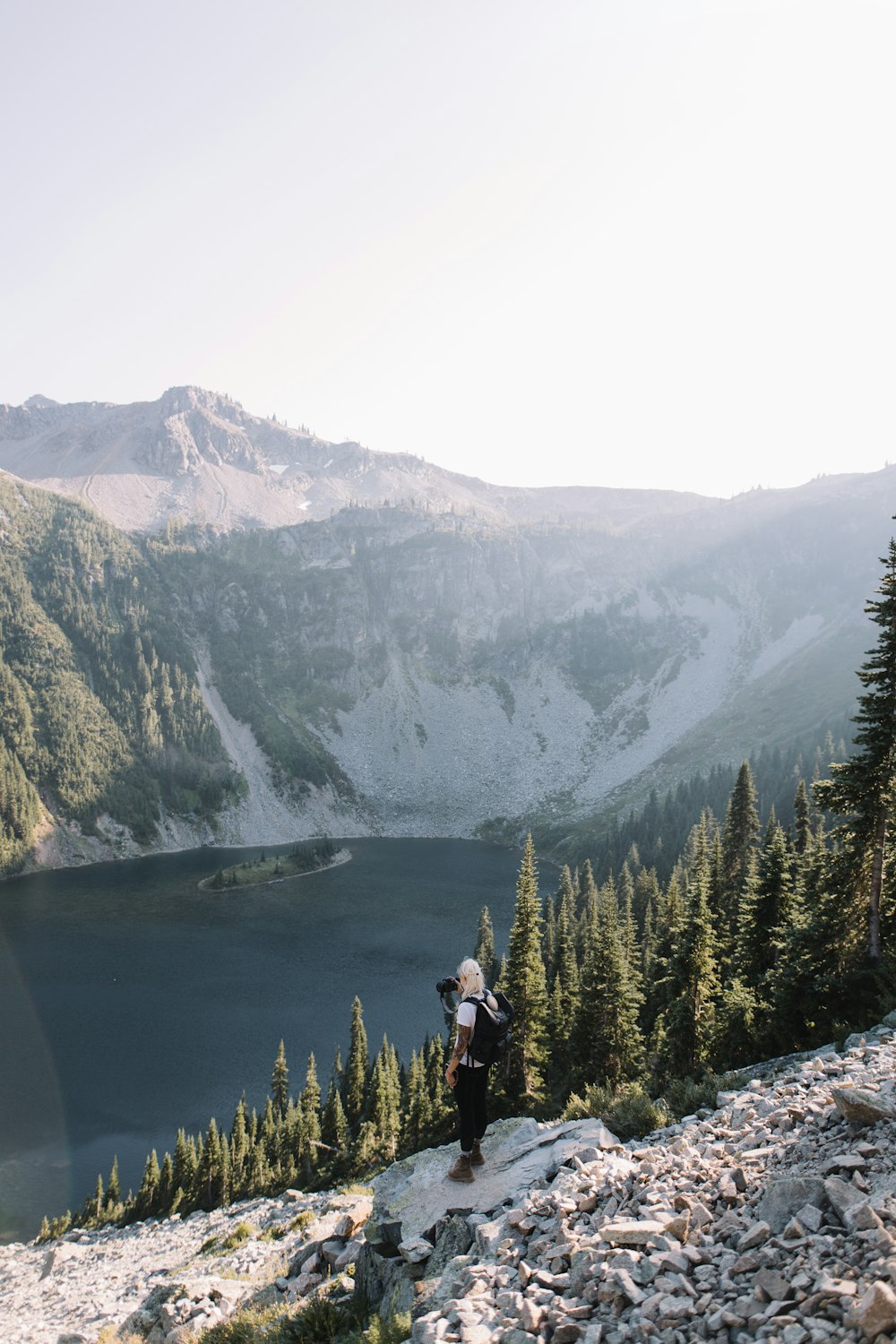 woman standing near the cliff