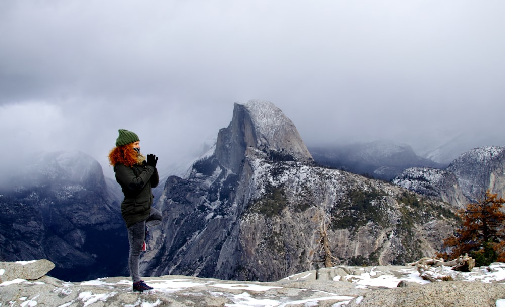 person on top of mountain