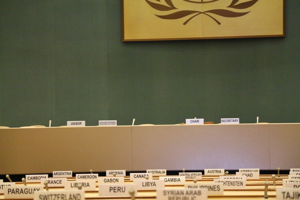 a room filled with lots of tables covered in signs