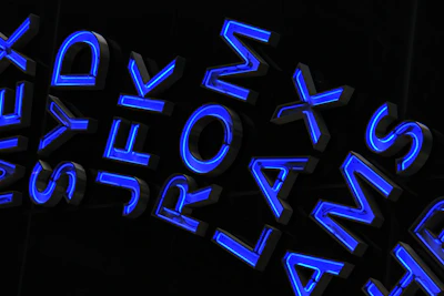 Array of custom aviation labels and removal tags displayed on a sleek black and blue background.