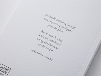 a close up of a book with a quote on it