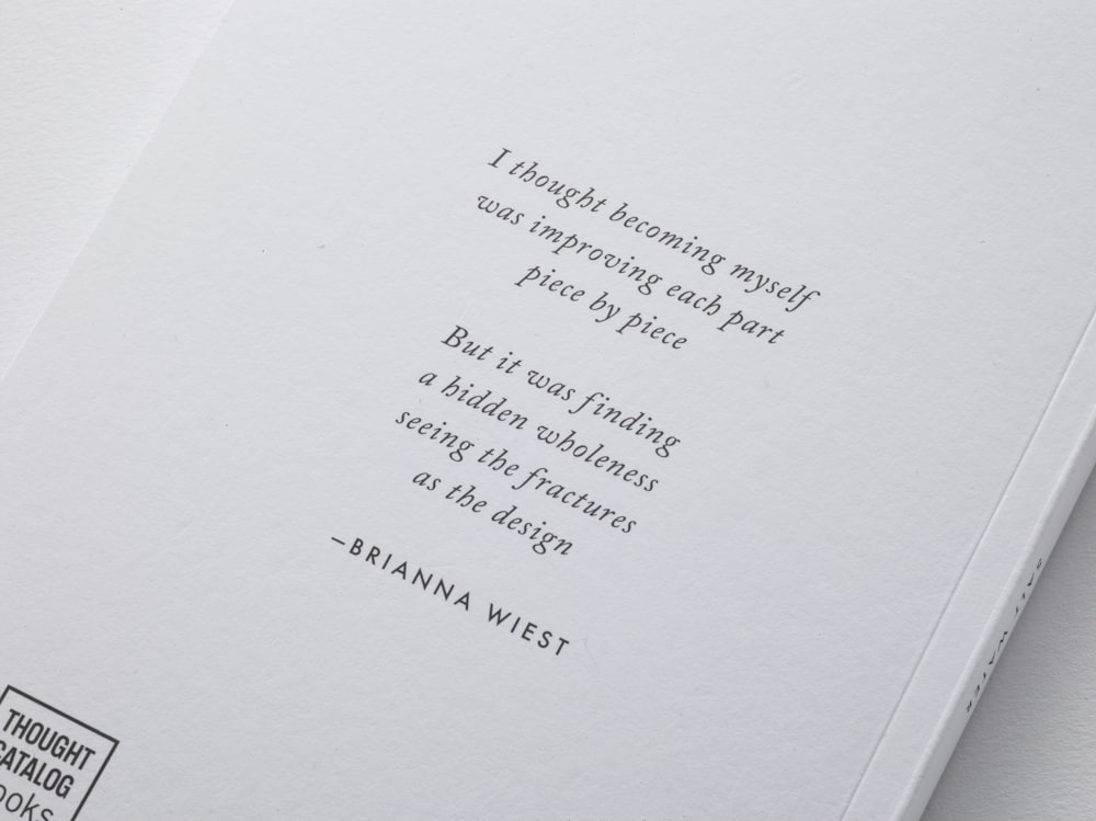 a close up of a book with a quote on it