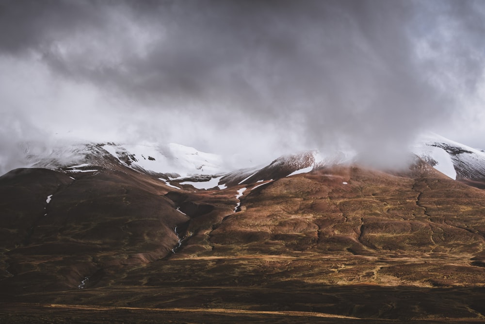 landscape photo of mountain covered by clouds