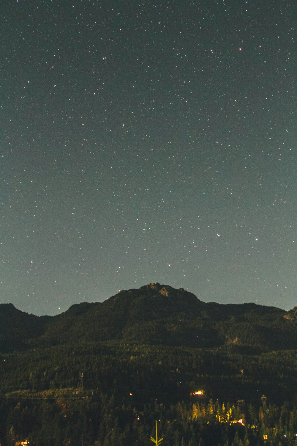 mountain under stars