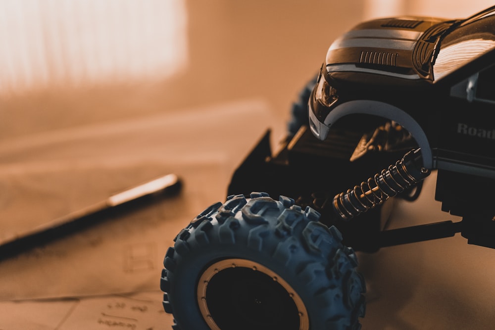 a remote control car sitting on top of a desk