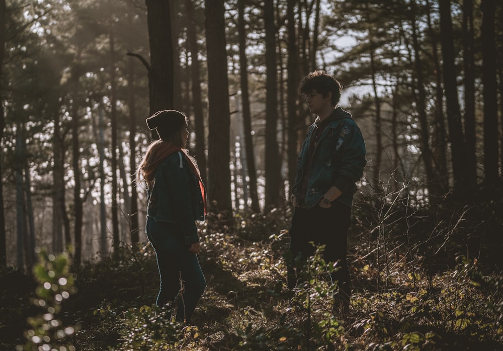 couple in woods during daytime