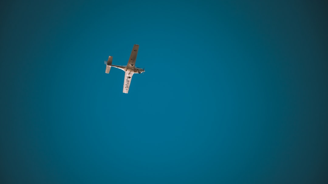low angle photography of monoplane, Being completely isolated in the wilderness and hearing the buzz of a single plane.
