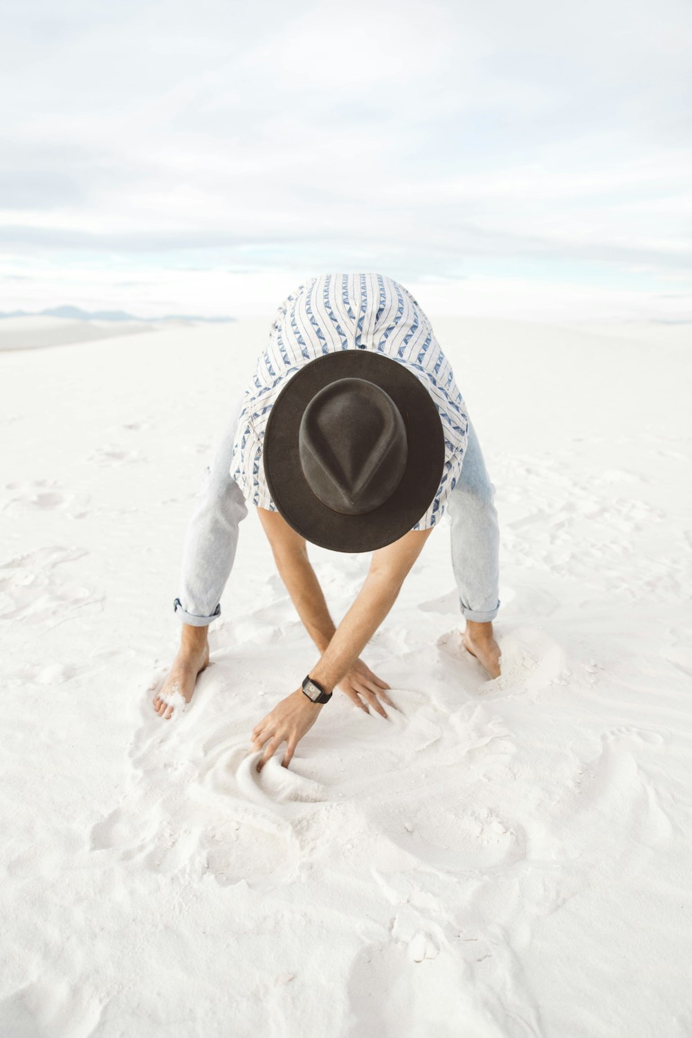 person standing on sand