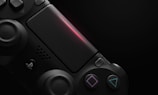 black Sony PS4 wireless controller