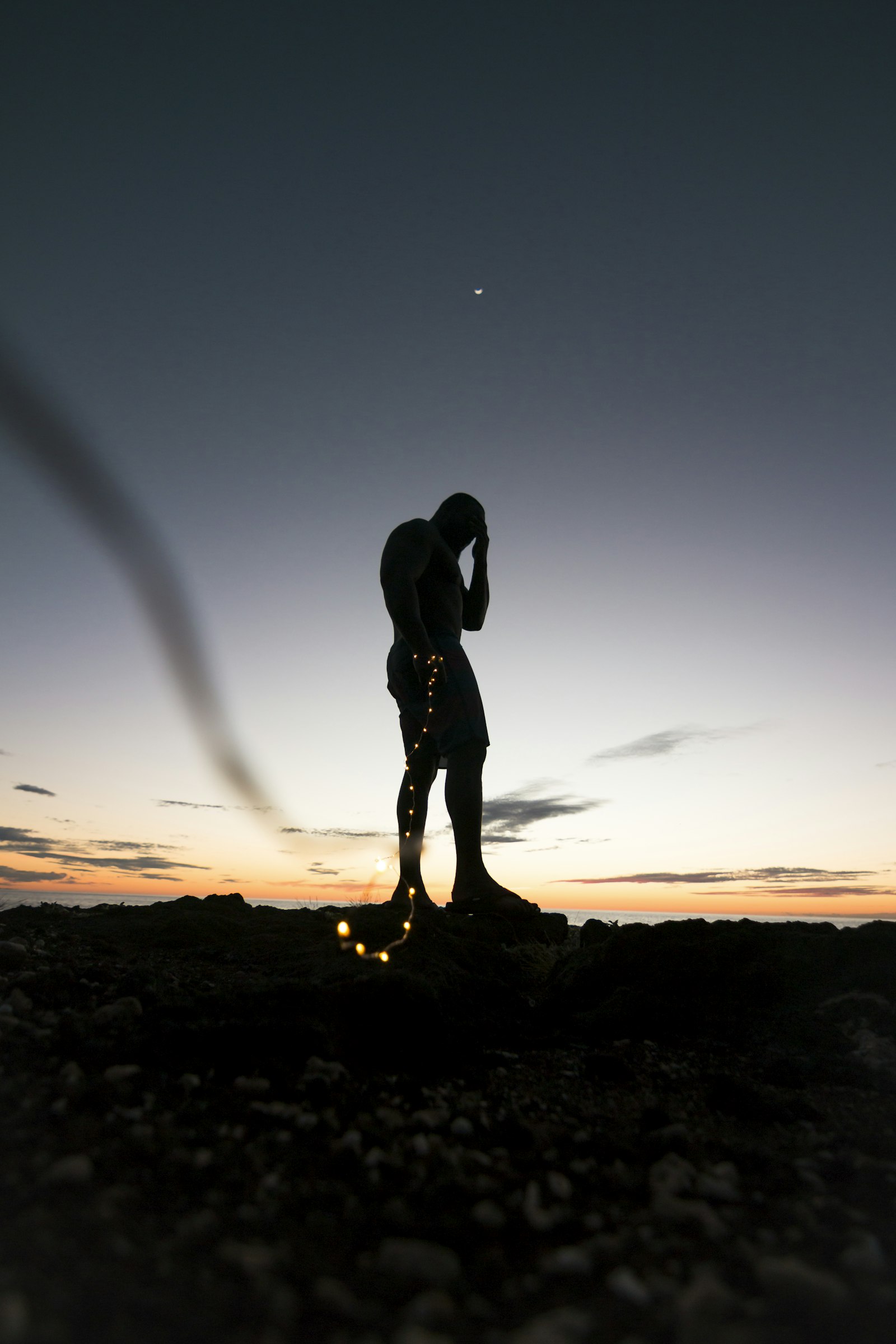 Canon EOS 70D + Tokina AT-X Pro 11-16mm F2.8 DX sample photo. Silhouette of person standing photography