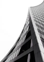 low angle photography of grey high-rise building