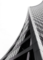 low angle photography of grey high-rise building