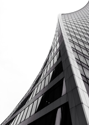 low angle photography of grey high-rise building