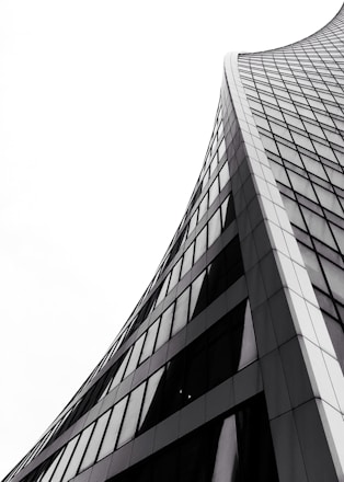 low angle photography of grey high-rise building