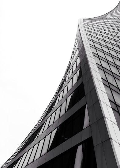 low angle photography of grey high-rise building