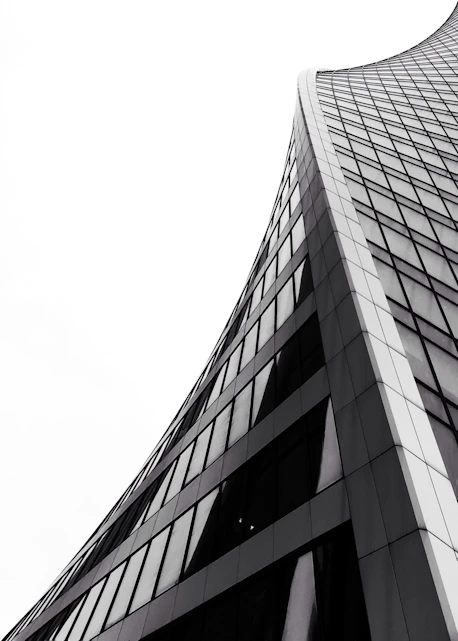 low angle photography of grey high-rise building