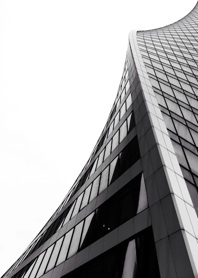 low angle photography of grey high-rise building