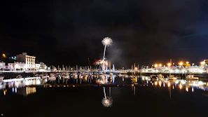 View of Marseille's Vieux-Port lit up during an evening event