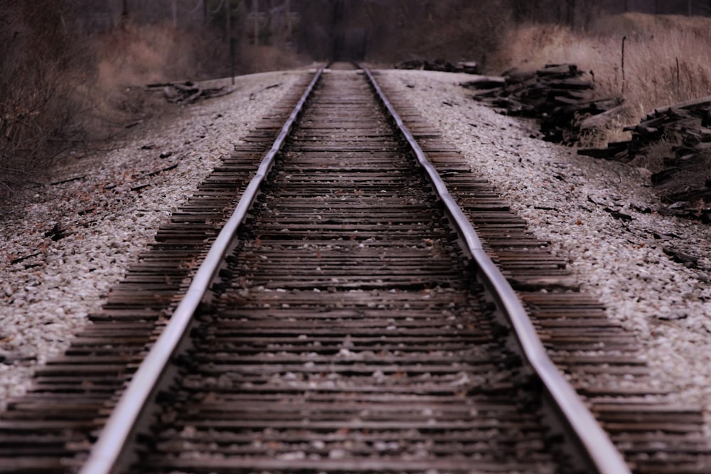 low-angle photo of train rail