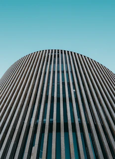 The consulate building's modern facade under a clear Sydney sky
