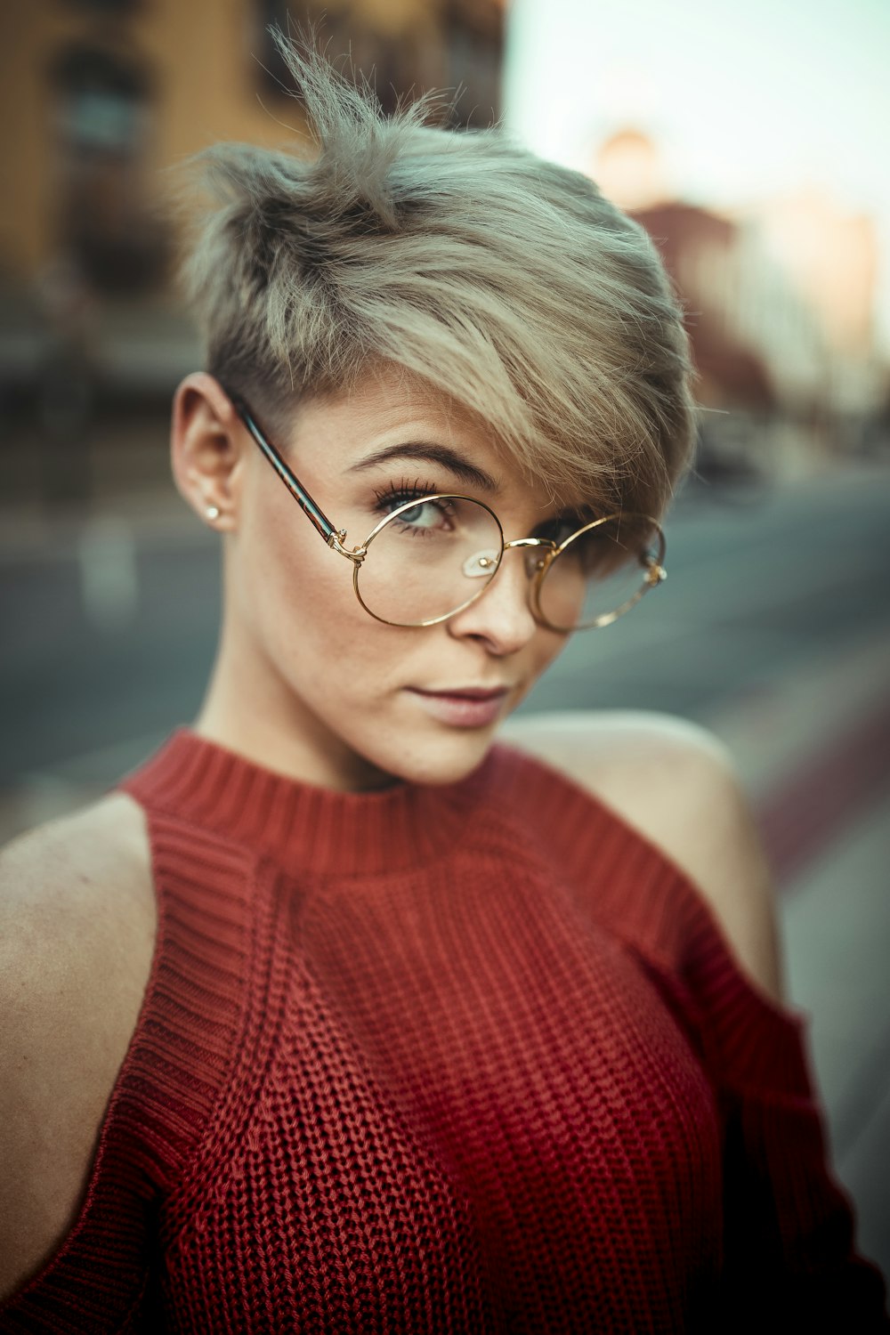 woman wearing round eyeglasses