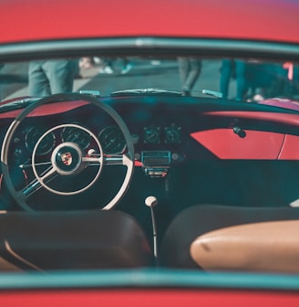 red and black Porsche vehicle interior