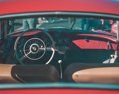 red and black Porsche vehicle interior